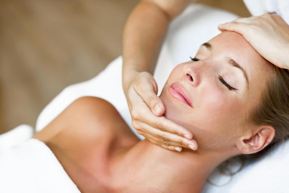 young-woman-receiving-head-massage-spa-center (1).jpg